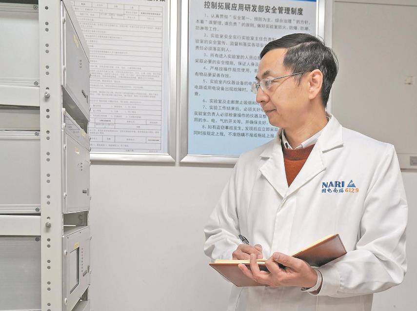 【國網(wǎng)特等勞?！坷钔簽榇箅娋W(wǎng)安全穩(wěn)定運行添“利器”